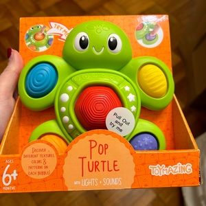 NWT Toymazing Pop Turtle with Lights and Sounds